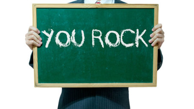 Green Chalk board showing feedback that reads "You Rock"