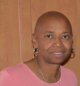 Black woman with bald head